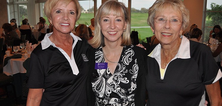 Chairwomen Pat Luber and Cerita Purmort with Oliva Thomas, center, director of SPARCC. Chairwomen Pat Ryan and Florence Jensen not pictured.