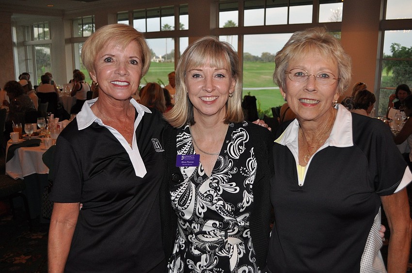 Chairwomen Pat Luber and Cerita Purmort with Oliva Thomas, center, director of SPARCC. Chairwomen Pat Ryan and Florence Jensen not pictured.