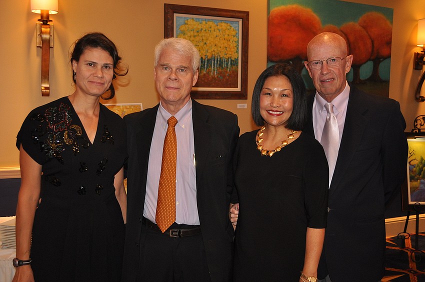 Denise Filotas with her father, Bill Filotas, and Gigi and Larry Freeman