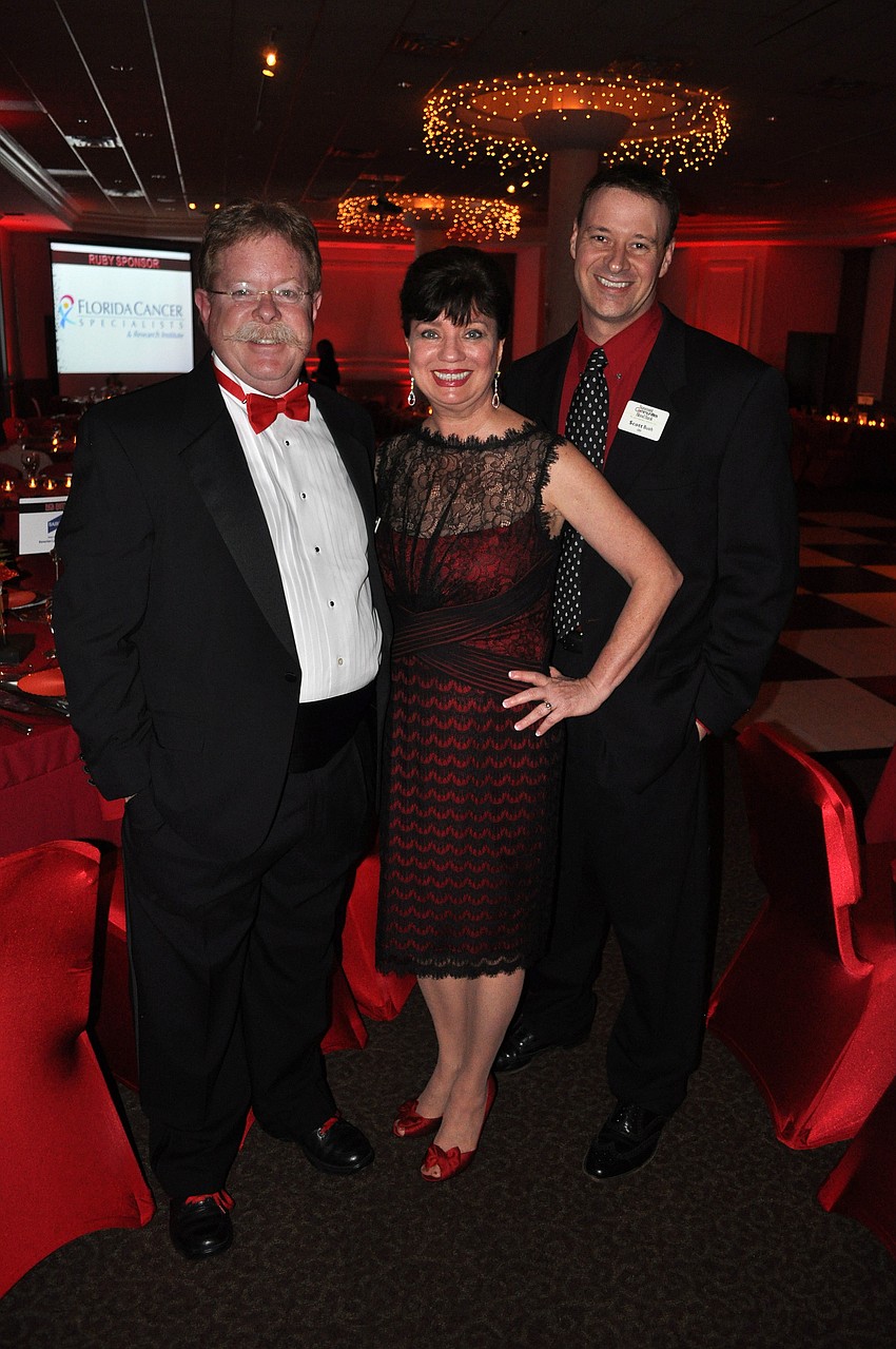 Bill Herron, Board President Mary Ann Legler and CEO Scott Bush