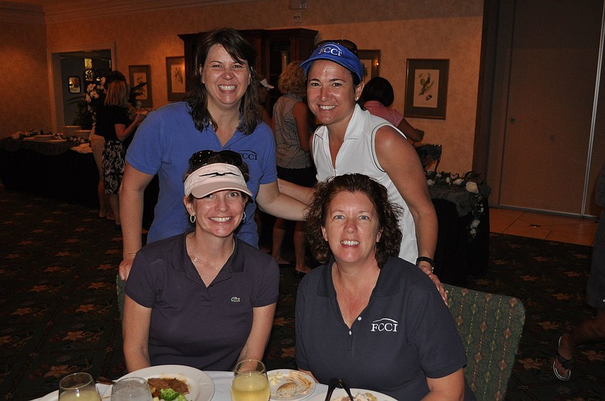 Tiffany Hale and Carey Geaglone, in back, with Laura Geist and Colleen Berish, seated