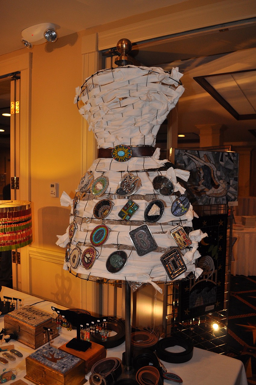 Belt buckles created by mosaic artist Janice Schmidt.