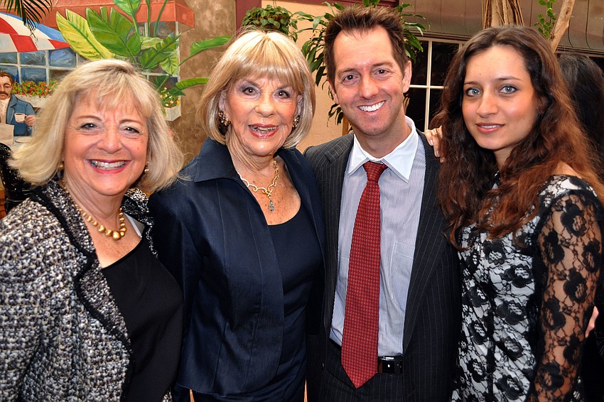 Marian Moss with her mother, honoree, Gloria B. Moss, and Gloriaâ€™s grandson Jeffrey Album and his wife, Slava.