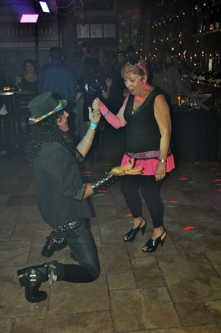 Brent Greeno has fun on the dance floor with Linda Crispino.