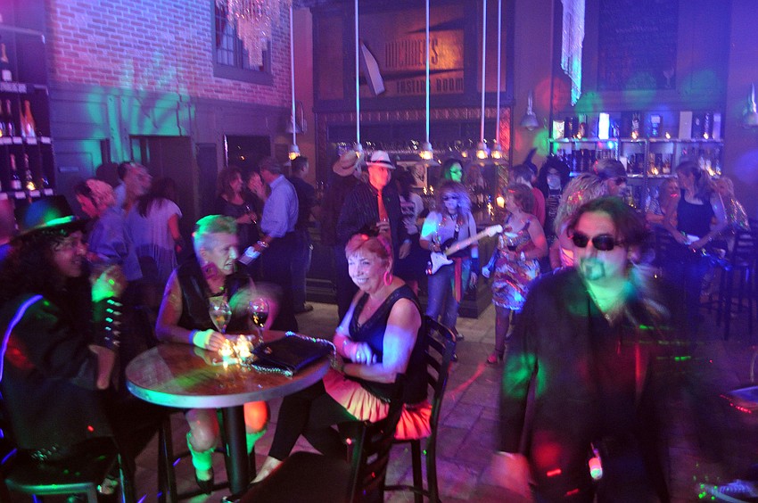 Michaelâ€™s Wine Cellar transformed into an 80â€™s dance spot Friday, Sept. 14 for the Make A Wish Foundationâ€™s Rock of Ages event.