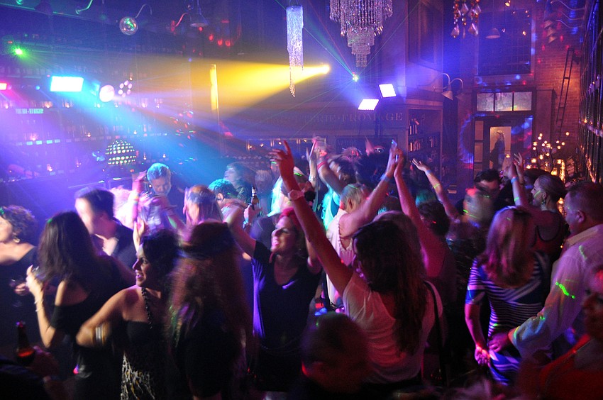 Multi-colored lights, fog machines and a DJ helped to set the tone for Rock of Ages Friday, Sept. 14 at Michaelâ€™s Wine Cellar.