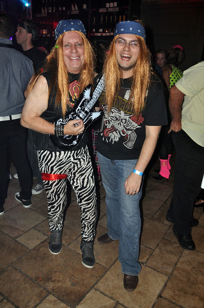 Mike Rogers and his son, Tom Rogers, rocked out at Rock of Ages Friday, Sept. 14.