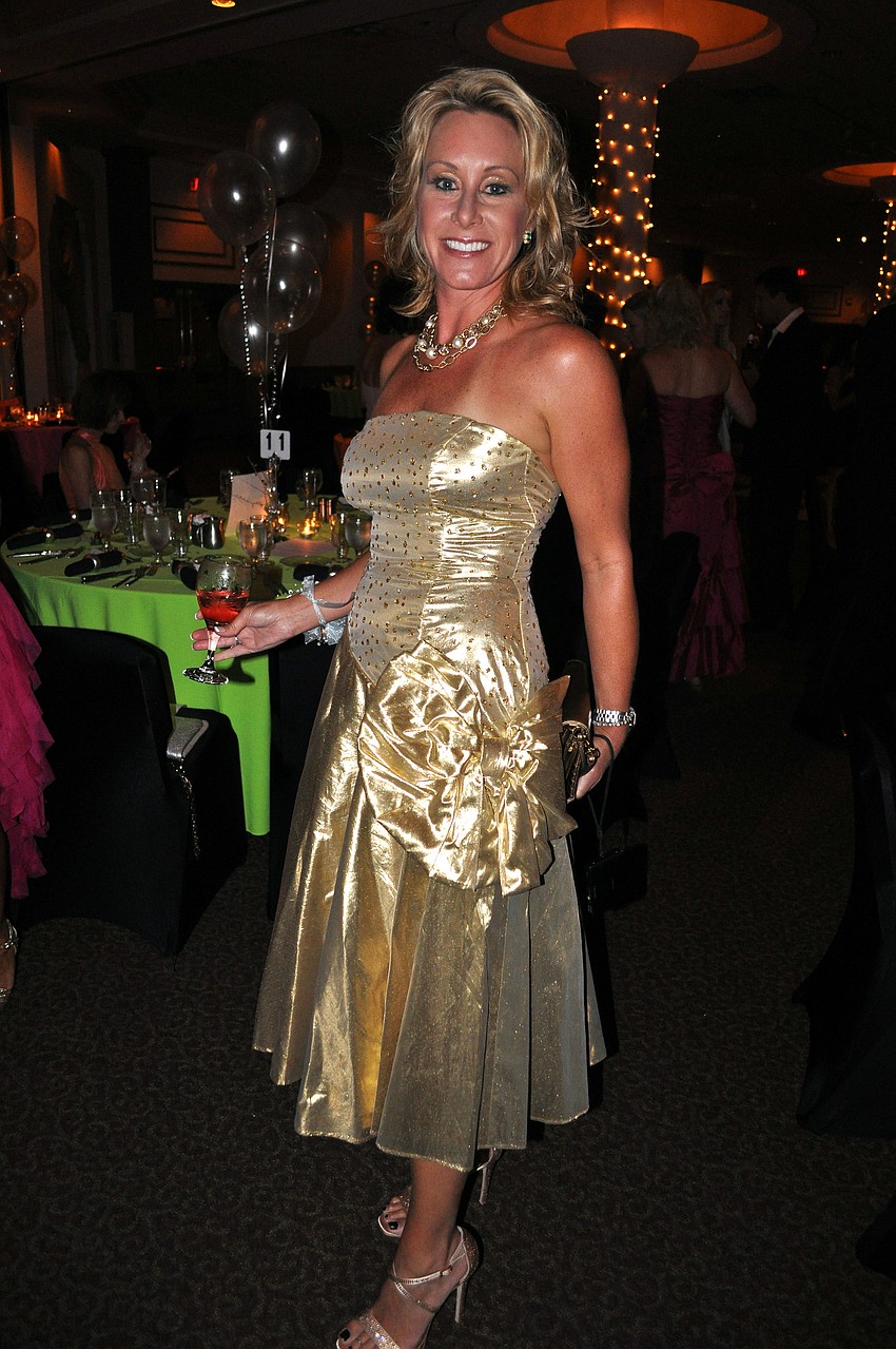Jennifer Allen wears her prom dress from 1988.