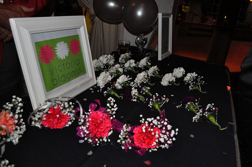 Guests could purchase boutonniÃ¨res and corsages from Victoria Bloom.