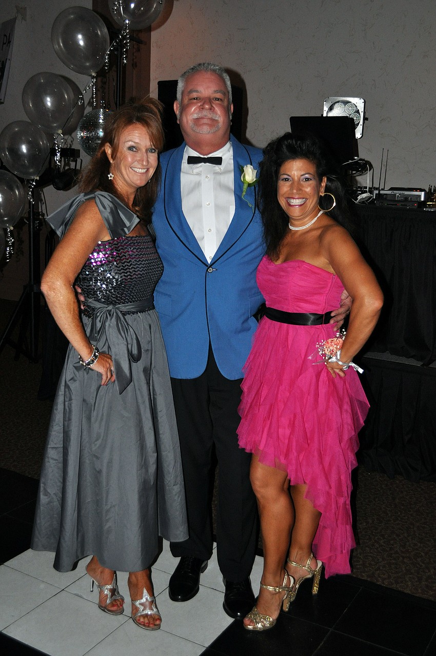 Co-chairs Karin Leereveld and Rosemarie McKee pose with Southside Principal Steve Dragon