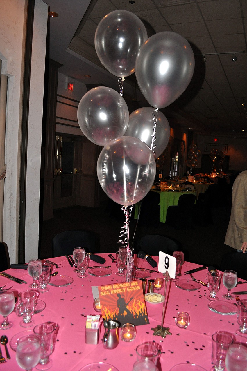 One of the many tables set up for Southsideâ€™s Prom Night Saturday, Sept. 15 at Michaelâ€™s on East. Each table was not only numbered but given a different song name that was a popular song from when Southside alumni attended prom.