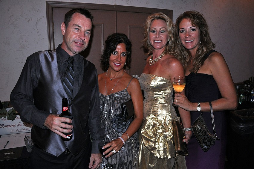Jerry and Lisa Wells with Jennifer Allen and Carla Rodriguez
