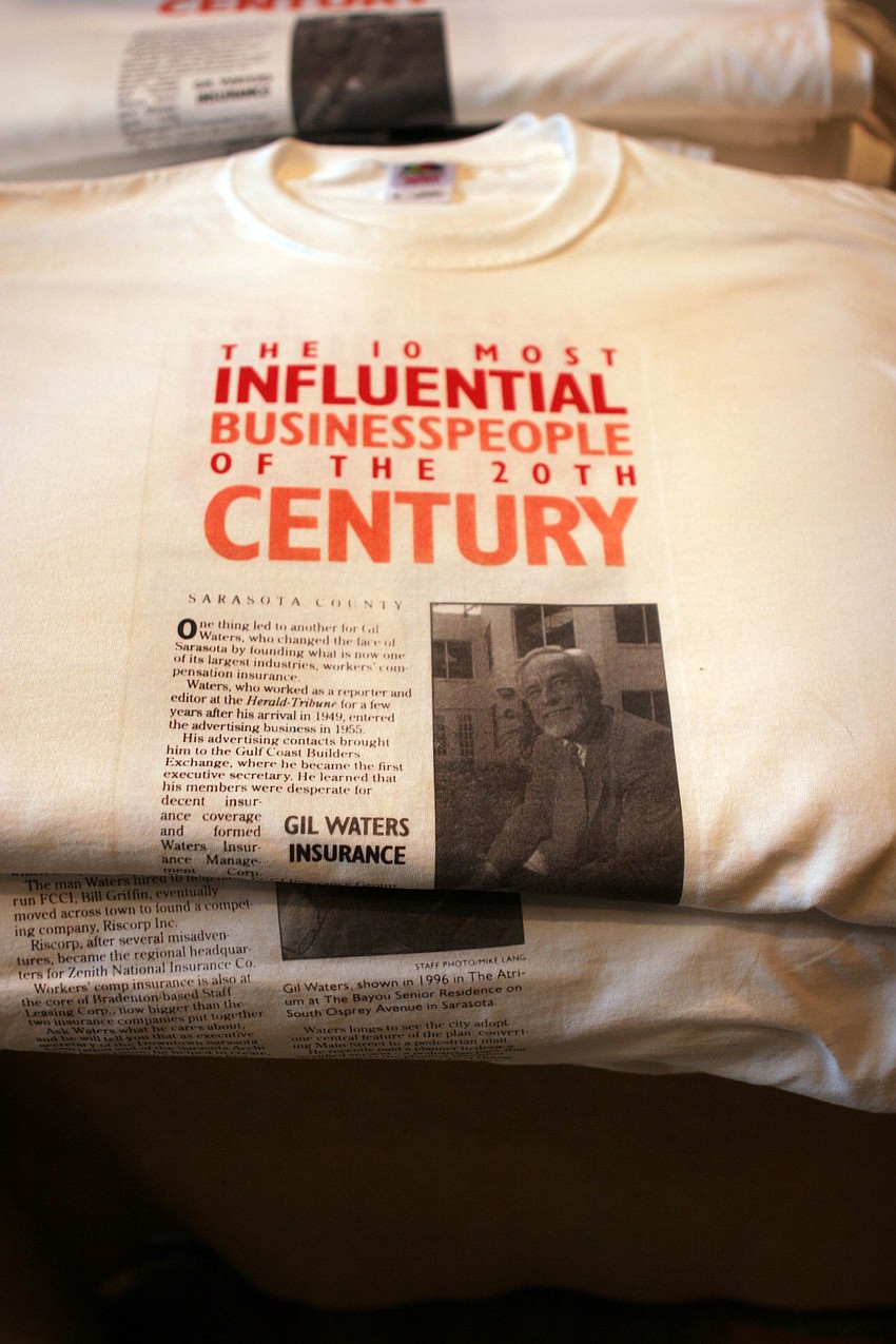 A t-shirt with an article from the Sarasota Herald Tribute about Gil Waters in 1999.