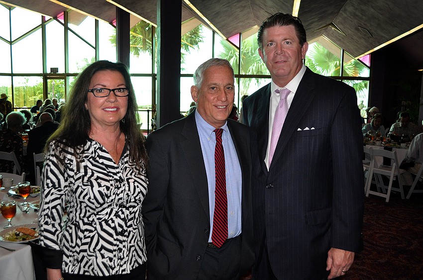 Sponsors Janet and Richard Smalley with guest speaker Walter Isaacson