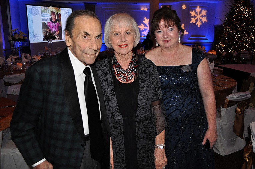 Harold and Carol Phillips, board president, with Pamela Day, business development director