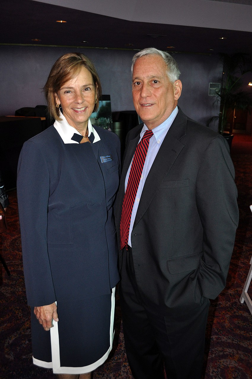 Merry Williams, president of RCLA, and guest speaker Walter Isaacson