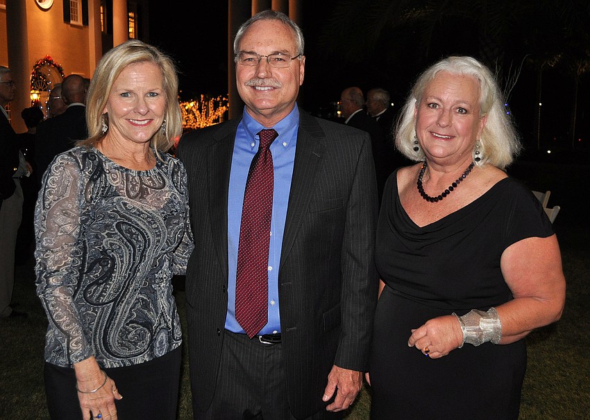 Katie and Peter Hayes with Susan Erhart, president of the auxiliary board