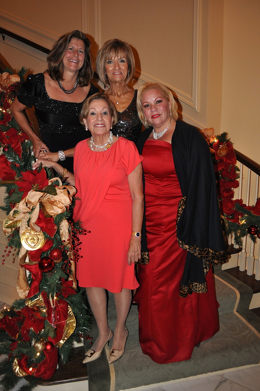 Laura Corella, Patti Good, co-chair, (back) with Carol Chiarella, chair, and Valarie McKay (front)