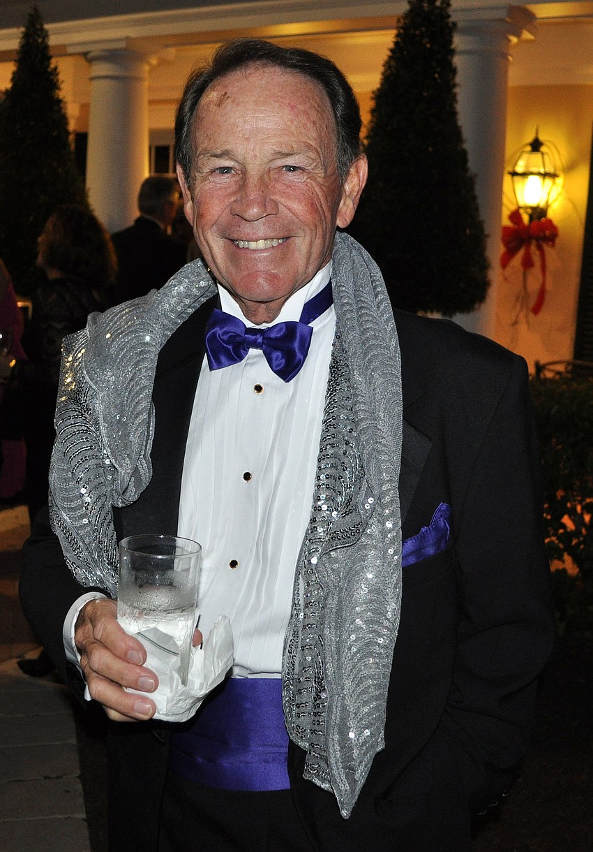 Bruce Brookshire dons his wife's shawl.