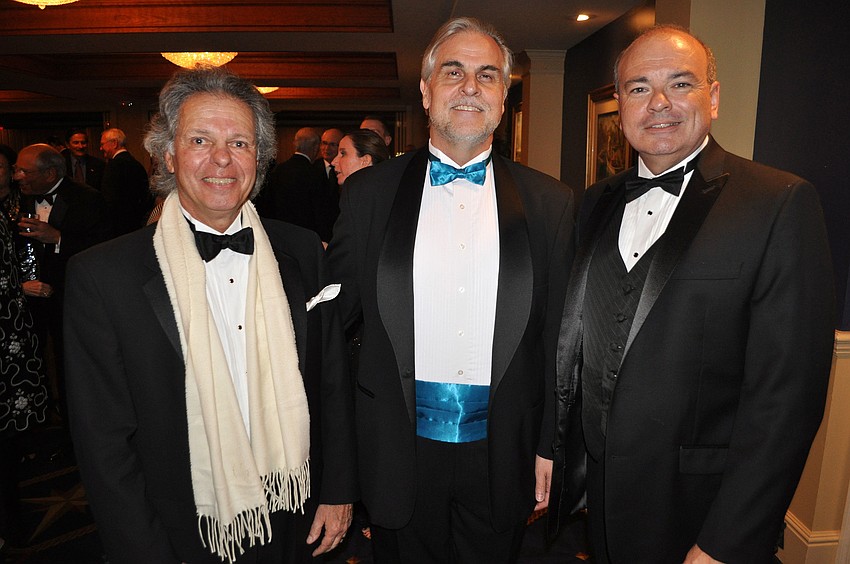 Richard DeGennaro, president of the Bradenton Opera Guild, with Victor DeRenzi, artistic director of the Sarasota Opera, and Richard Russell, executive director of the Sarasota Opera