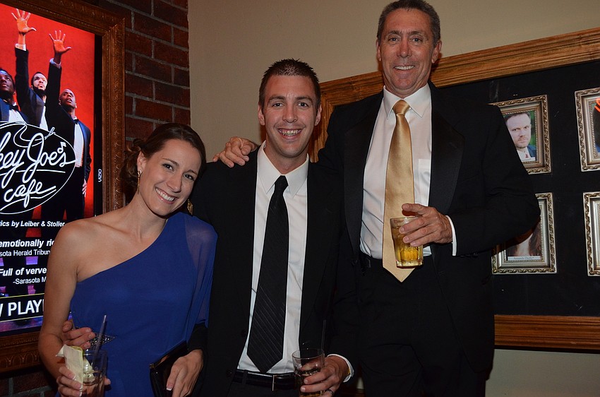 Amanda and Scott Parrish with Roger Courtois