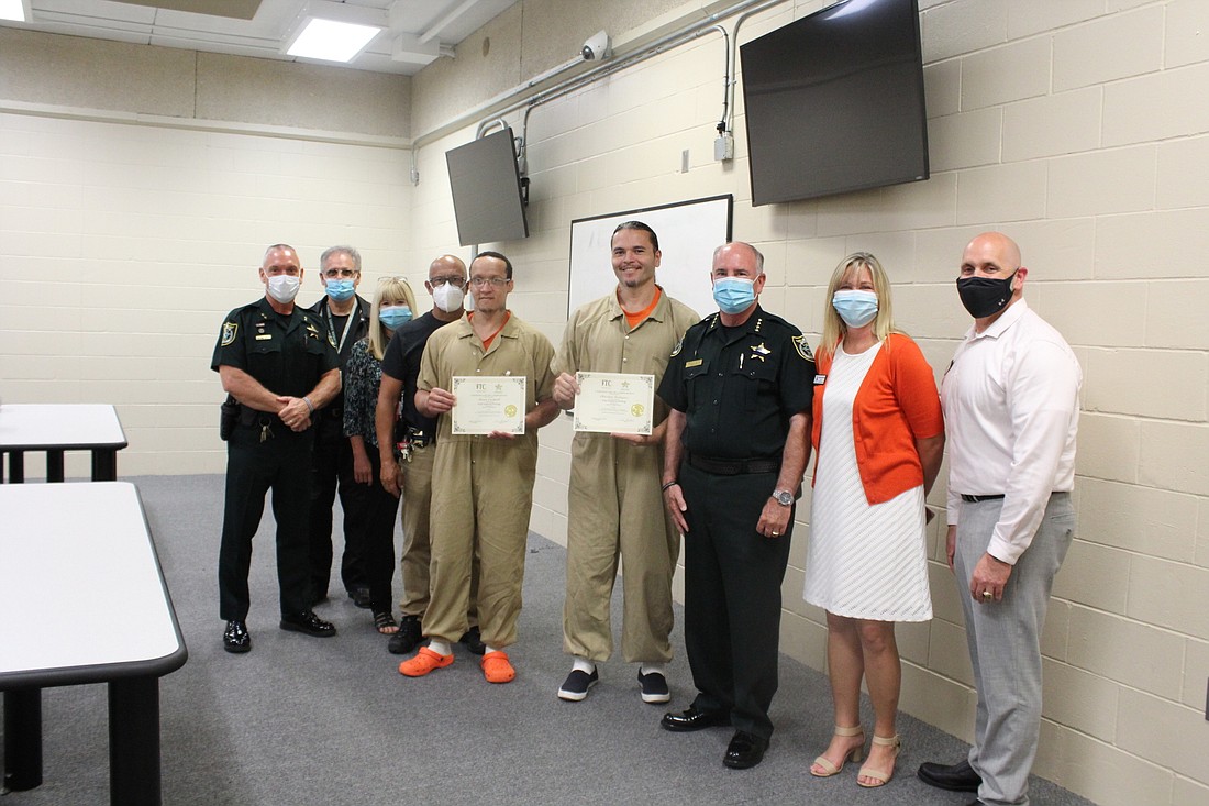The two Homeward Bound graduates with FTC and FCSO partner representatives and Sheriff Staly. Courtesy photo
