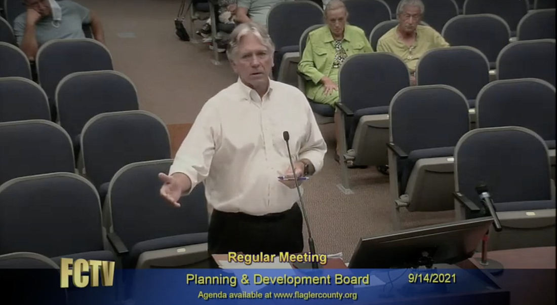 Attorney Dennis Bayer addresses the planning board. Image from board meeting livestream