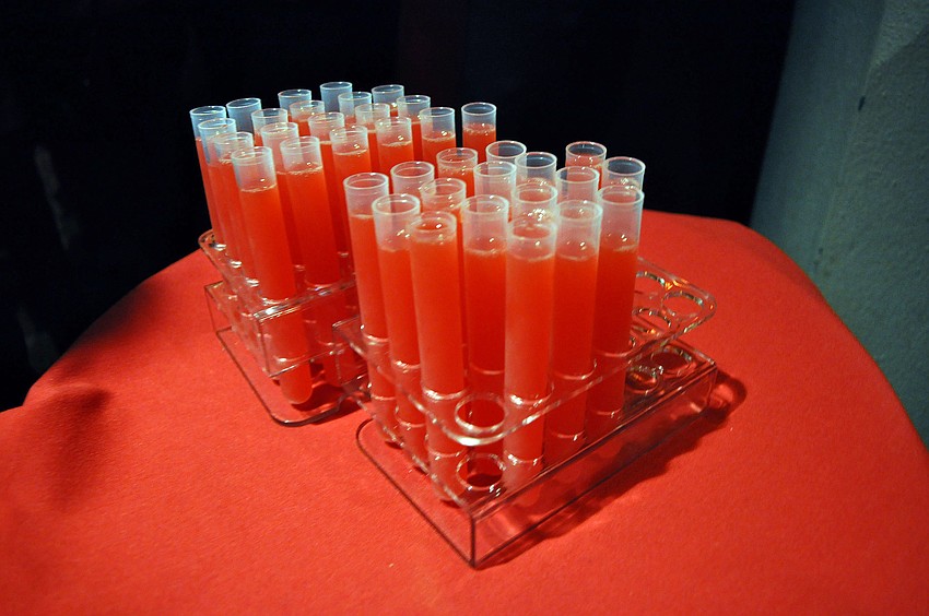 Rum and punch shots in test tubes.