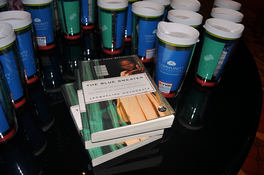 Guest speaker Jacqueline Novogratzâ€™s book The Blue Sweater and Tervis Tumblers from the Community Foundation were on display.