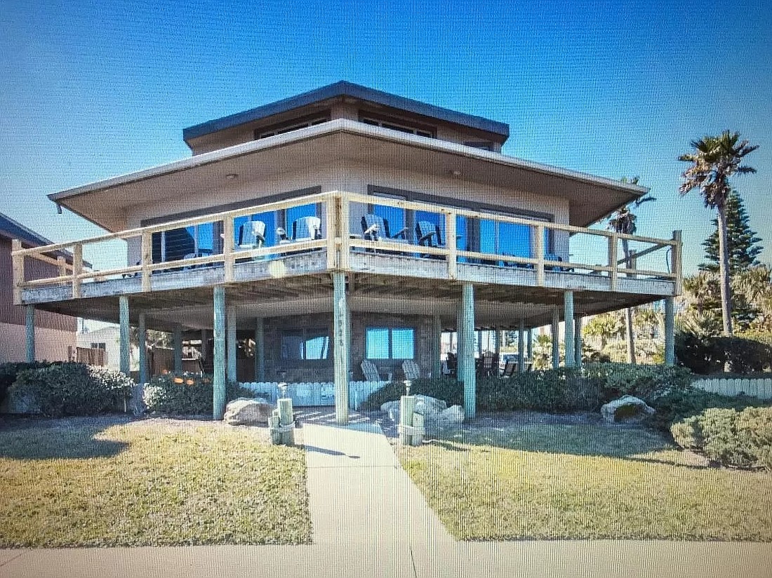The top seller was a three-story house with an extra, separate lot and an outdoor tiki bar. Courtesy photo