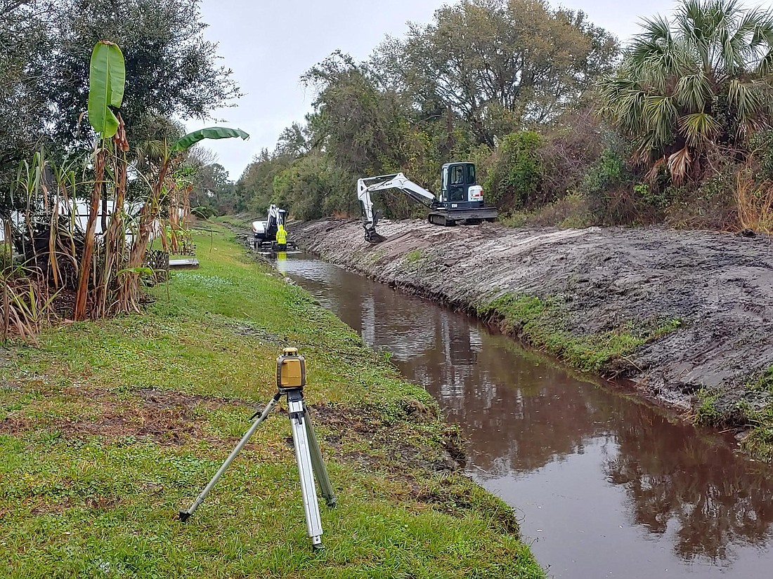 Stormwater staff work on a ditch on Felshire Lane. Courtesy photo