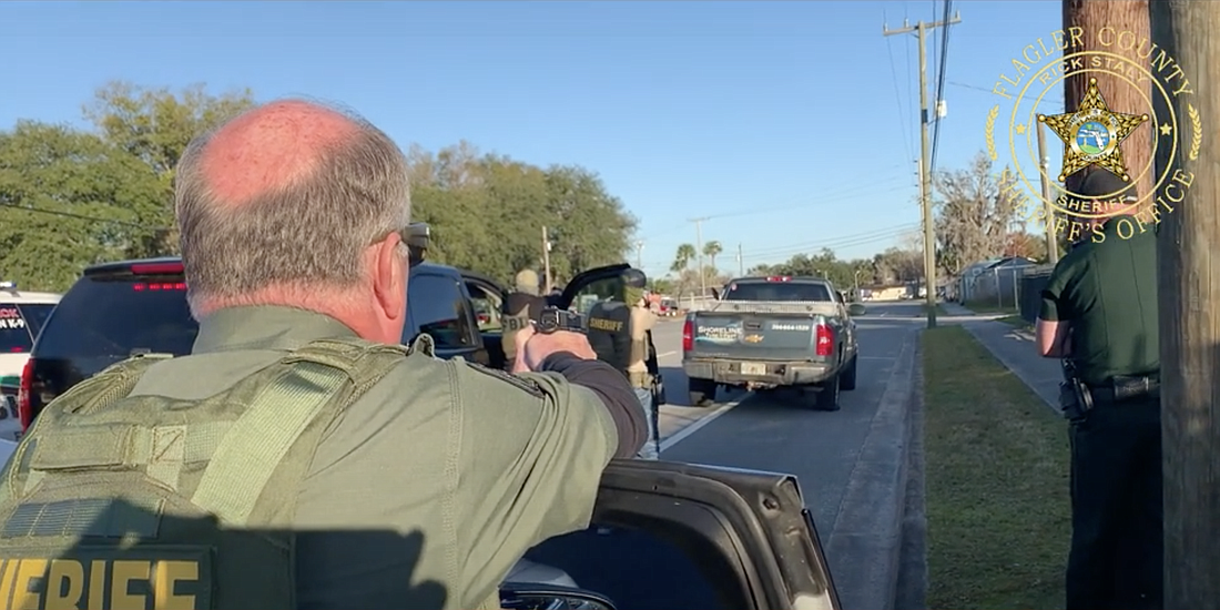 Sheriff Rick Staly and others conduct a felony stop on the stolen work truck.