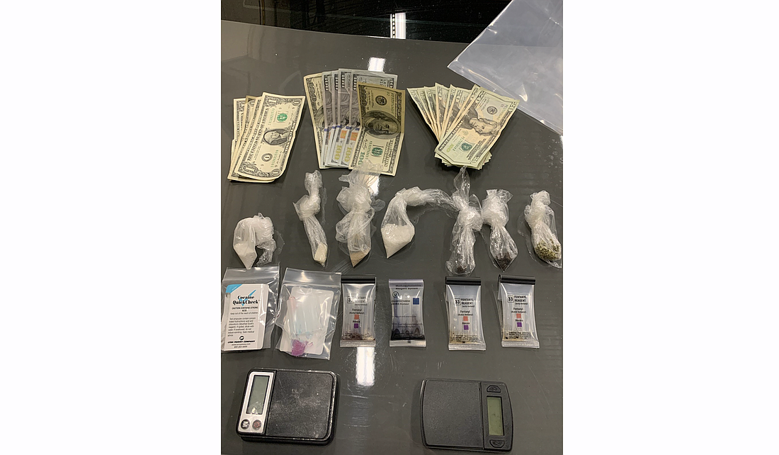 Drugs and cash recovered from a suspected drug dealer. Photo courtesy of the FCSO