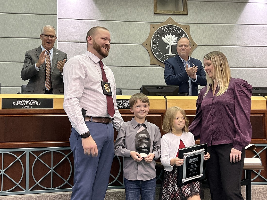 Thomas Garcia, with wife Amanda and children Jaxon and Dylan. Photo by Brian McMillan