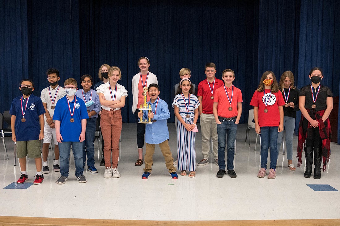 2022 Flagler Schools District Spelling Bee; Spencer Edelstein with winner's trophy in the center. Courtesy photo