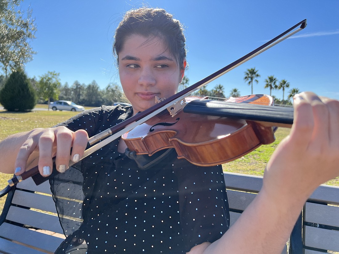 Hannah Lopez is a member of the Flagler Youth Orchestera quartet, as second violin. Photo by Brian McMillan