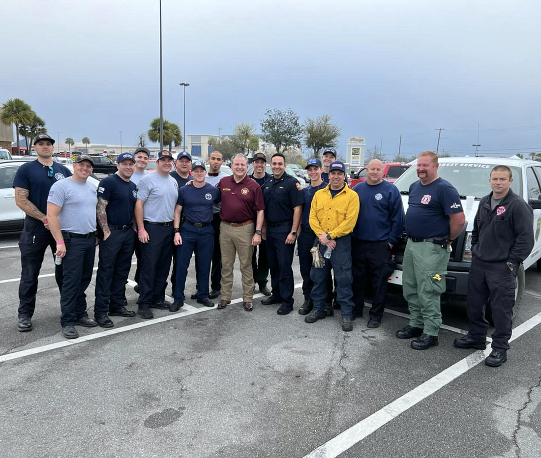 Palm Coast firefighters and other members of an engine strike team met with State Fire Marshal and CFO Jimmy Patronis at the Incident Command Center for a morning briefing. Image courtesy of the city of Palm Coast