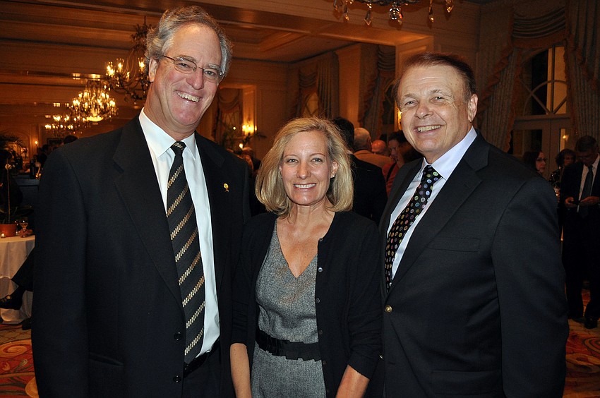 Joel and Diane Schleicher with Larry Thompson, president of Ringling College of Art + Design