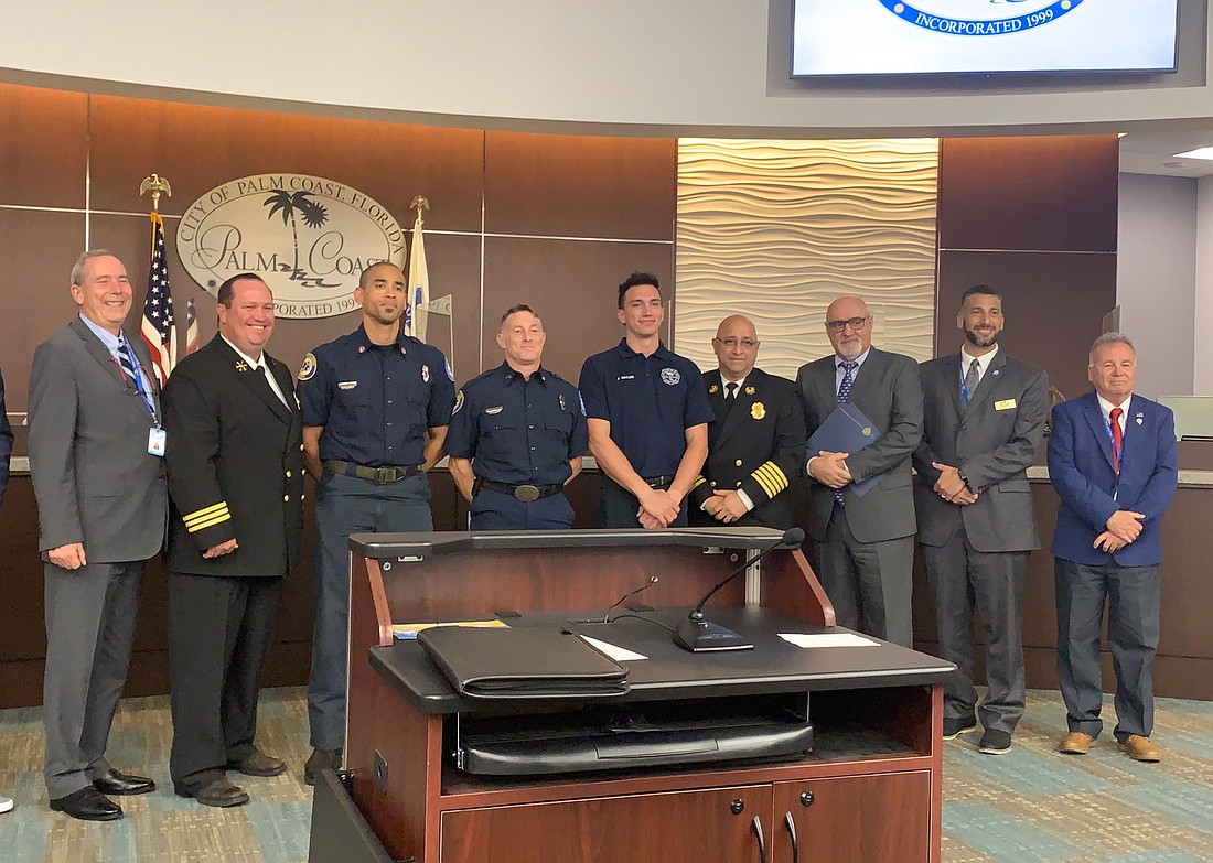 City Council members with Palm Coast firefighters. Photo by Jonathan Simmons