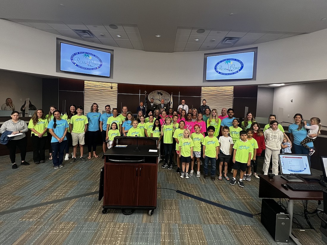 Swim team members at a City Council meeting April 5. Photo courtesy of the city of Palm Coast