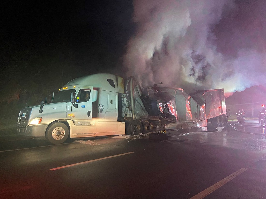 A semi-truck carrying cocoa caught on fire Monday, April 18. Courtesy of FHP