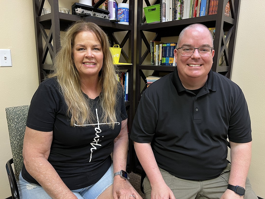 Lead Pastor Mike Adler, right, with Director of Family Connections Mary Benvenuto. Her husband, Tony, was owner of Benvenuto's Pizza in the 1980s and 1990s, and is now a teacher at Matanzas High School. Photo by Brian McMillan