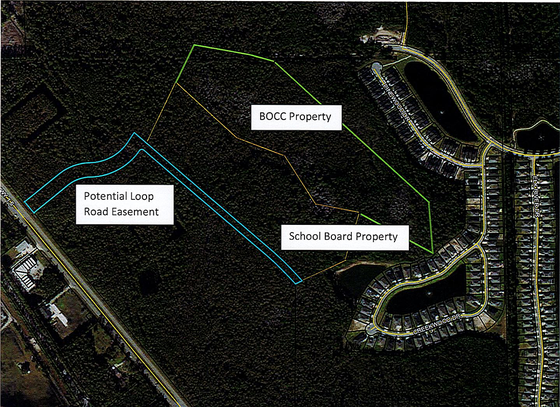 A screen shot of a school district map showing the School Board's  26-acre property and the Board of County Commissioners' 30-acre property in Plantation Bay with a potential loop road easement to U.S. 1.
