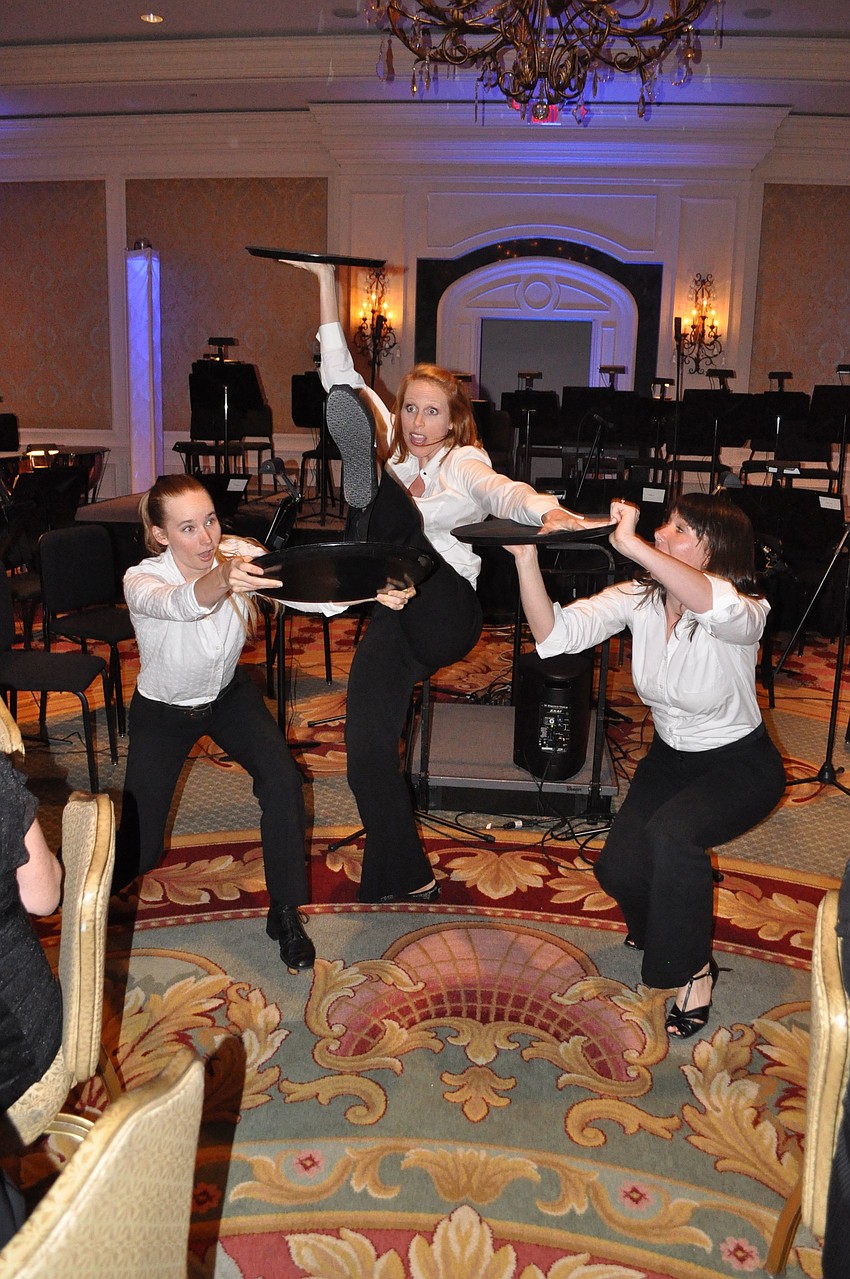 Fuzion dance performed as waiters throughout the crowd.
