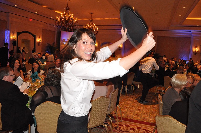 Fuzion dance performed as waiters throughout the crowd.