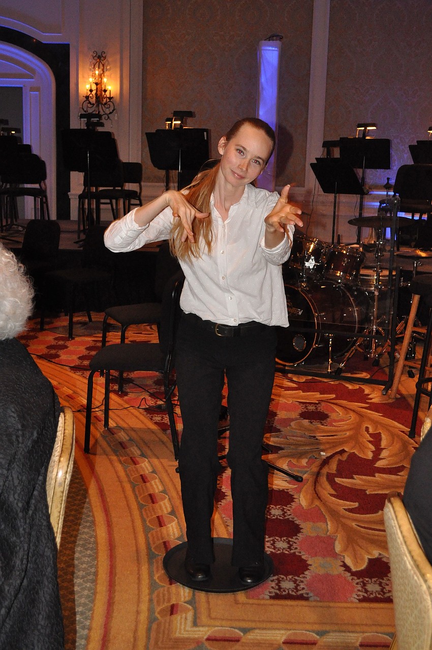 Fuzion dance performed as waiters throughout the crowd.
