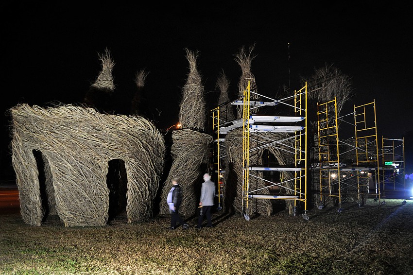 A view of the stick sculpture at night.