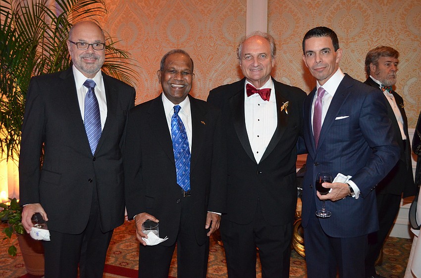 Bob Essner, Dr. Kumar Mahadevan, Bob Carter and Paul Carreiro