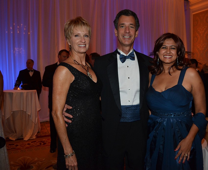 Candy and Scott Greer with Ausiya Mohamud