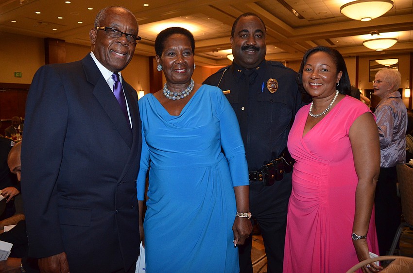 Donald and Doris Johnson, Sarasota County Police Chief Mikel Hollaway and his wife, Francina